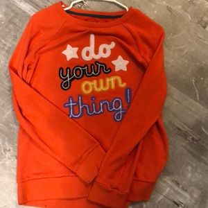 Orange long sleeve shirt